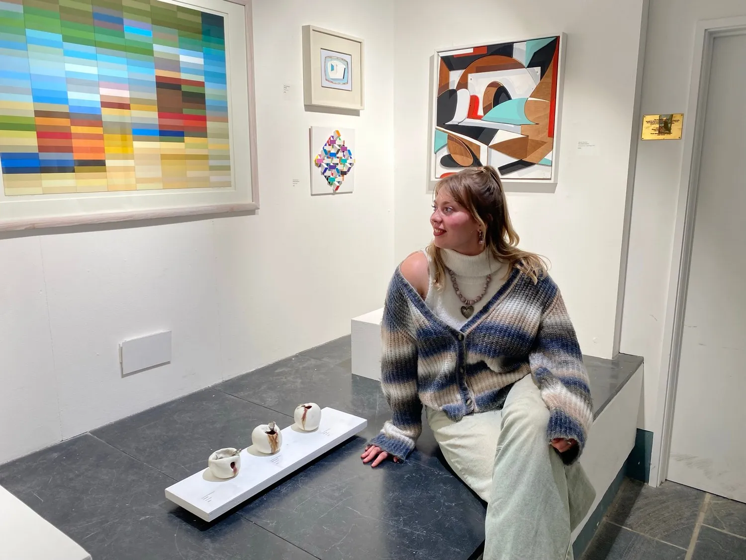 At the Winter 2023 exhibition beside a display of porcelain apples.